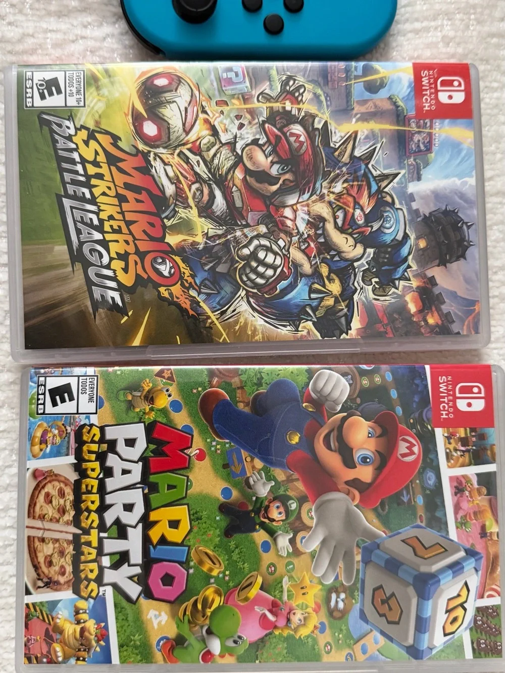 Nintendo Switch with Neon Red & Neon Blue Joy‑Con, Dock and Two Games